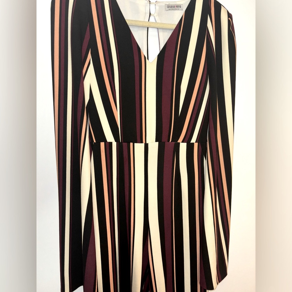 Jumpsuit with attached cape